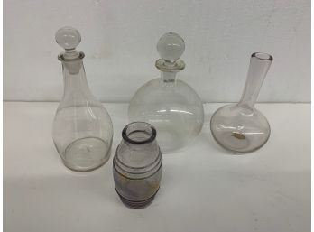 4 Misc Clear Glass Bottles Including 2 Decanters With Stoppers