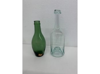 2 Early Bottles- 1 Hand Blown And 1 Green With Embossed Bottom