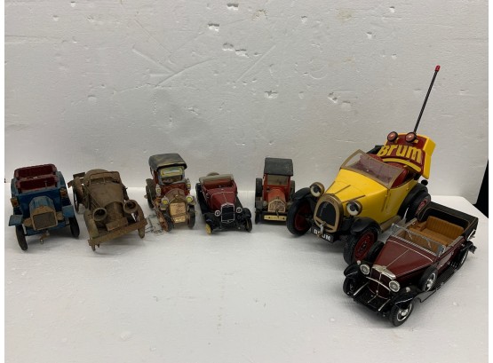 7 Misc Collectable Cars Including One Remote Control And One Radio Car