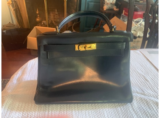 Sold at auction Vintage Black Box Leather Kelly Bag, Hermes