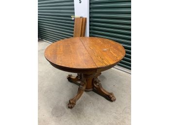 42 Inch Round Oak Pedestal Table With Three 10 Inch Leaves