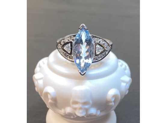 14k White Gold Blue Topaz And Paved Diamond Ring