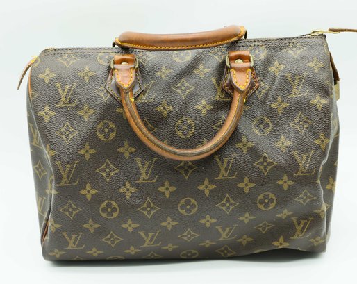 Sold at Auction: Louis Vuitton, Vintage Louis Vuitton Suitcase