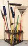 Lot Of Assorted Yard Tools, Rakes, Mops, Push Broom Sledgehammer  - Stand Included