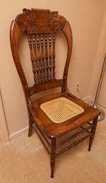 Antique Cherry Wood Pressed Back Chair With Cane Seat