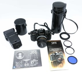 Canon A-1 Body, Soligor 24D Flash, 50mm Prime & 100-200 Lens, Filters & Camera Bag