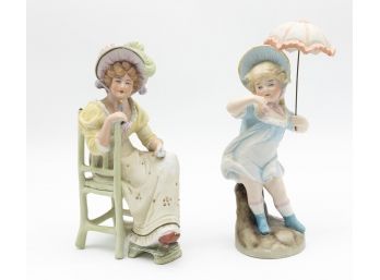Vintage Victorian Porcelain Sculpture Of Woman Sitting In Chair And Girl With Umbrella