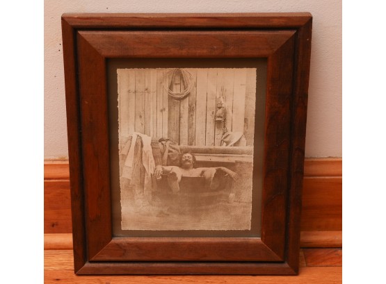 Framed Reprint Of Old Photograph Of Man Taking Bath