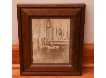 Framed Reprint Of Old Photograph Of Man Taking Bath