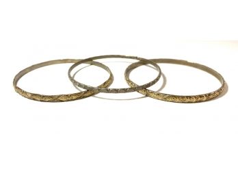 Three Engraved Bangle Bracelets