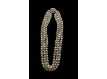 Triple Strand Of Pearls With Rhinestone Starburst Closure
