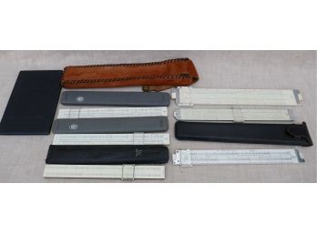 Collection Of Slide Rules And Book