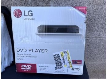 LG DVD Player And Dvd's