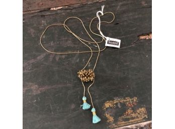 Gold Metal Necklace With Teal Tassels