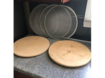 Set Of Pizza Stones And Three Pizza Screens