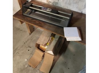 Tile Cutter And Box Of Tiles