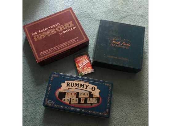 Rummy-O, Trivial Pursuit, Scrabble Slam And Super Quiz Games