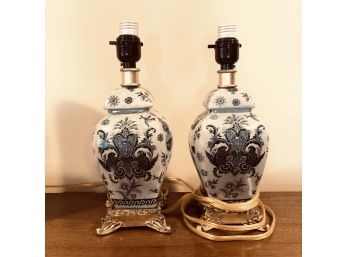 Pair Of Ceramic Lamps With A Gold Base