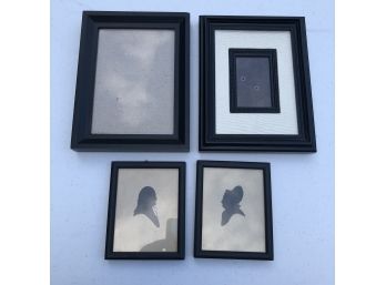 Framed Silhouettes And Black Picture Frames