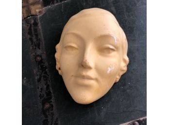 Plaster Ladys Head With A Hanging Wire