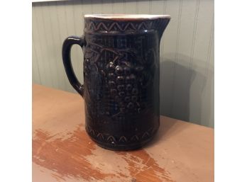 Pitcher With Grape Relief Design