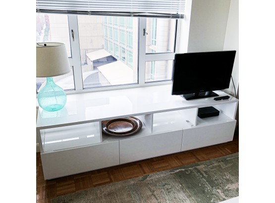 Modern White Console Table With Open Shelves And Drawer Storage