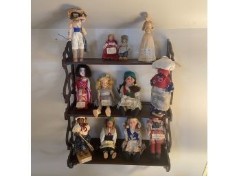 Wooden Shelves With 12 Dolls Of The World