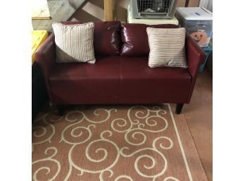 Maroon Leather Loveseat & Pair Of Striped Throw Pillows