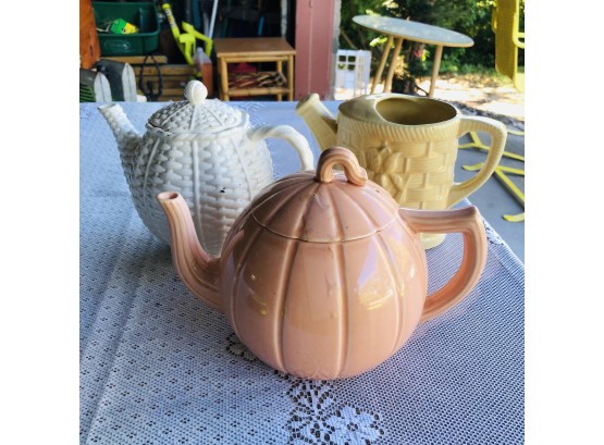 Two Ceramic Tea Pots And A Decorative Watering Can Ceramic Planter
