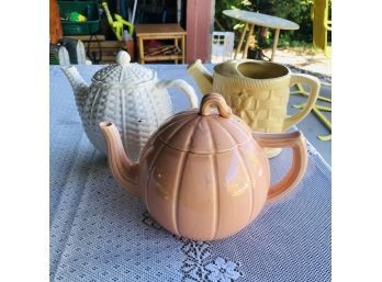 Two Ceramic Tea Pots And A Decorative Watering Can Ceramic Planter