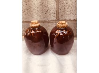 Pair Of Hull Pottery Bottles With Corks
