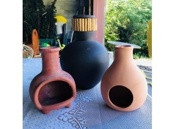 Terra Cotta Chimineas And Black Vase With Wood Trim