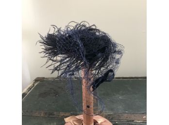 Feather, Ribbon And Mesh Fascinator
