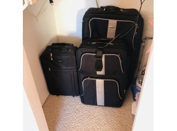 Set Of Three Rolling Luggage Pieces