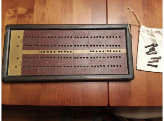 Cribbage Board With Cards And Pegs