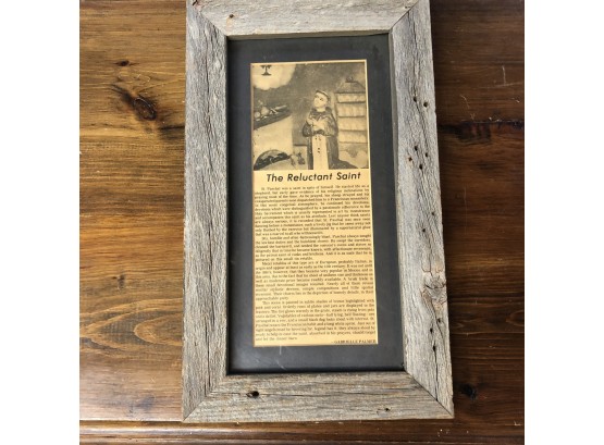 Framed Newspaper Clipping Of 'The Reluctant Saint'