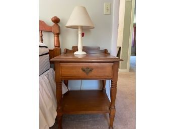Brown End Table With Small Lamp