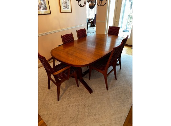 1980's Teak Danish Dining Table With 8 Chairs And 2 Leafs - Measures  75 1/2 By 43 1/2 - Extends By 38 12