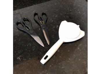 Two Pairs Of Kitchen Shears And A Jar Opener