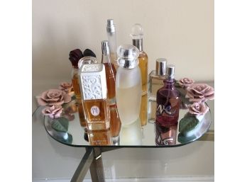 Perfume Bottles On A Mirrored Tray