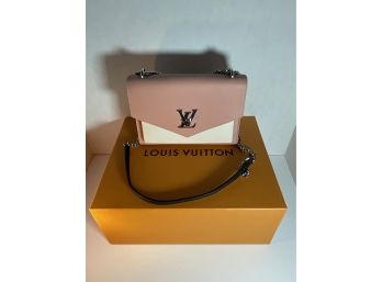 Louis Vuitton LockMe Pochette Leather Bag
