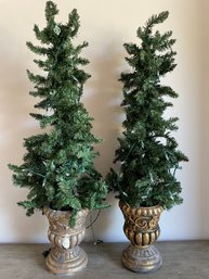 Pair Of Lighted Trees In Gold Urns