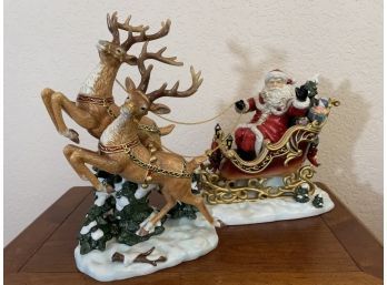 Porcelain Santa In Sleigh & Reindeer Set