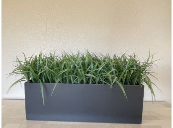 Artificial Grasses In A Wooden Trough