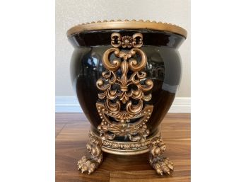 Black Pot With Gold Details On Footed Base
