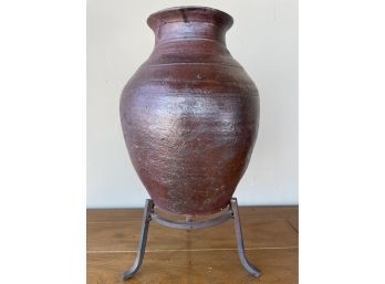 Rustic Glazed Urn On Iron Stand