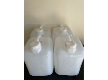 (4) 7 Gallon Water Containers