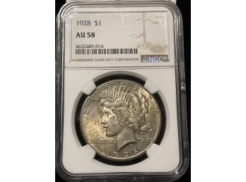 1928 Silver Dollar NGC AU58 (Key Date)