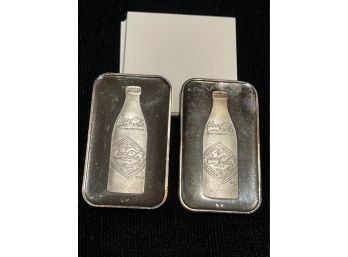 Two 1-oz. 999. Silver Coca Cola Bars