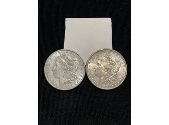 Two Silver Dollars (1880 And 1884)